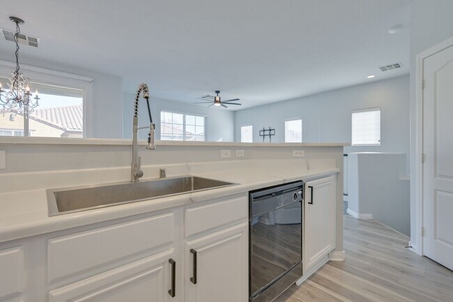 Building Photo - NW!! Gated!! Community Pool/Spa  Recreation Room!! New Paint!! New Flooring!!  Balcony!!  2 car g...