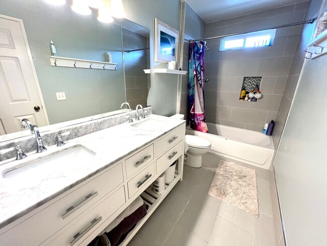 Building Photo - Two story 3 bedroom/2.5 bath home on corne...