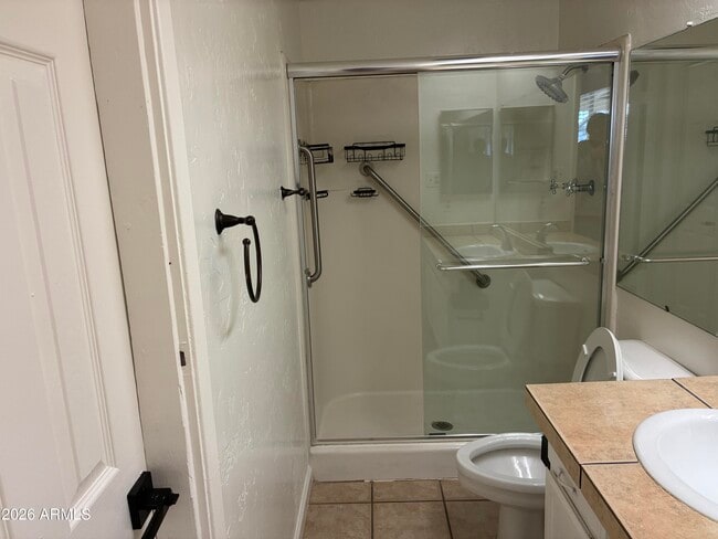 Building Photo - 8819 W Roma Ave