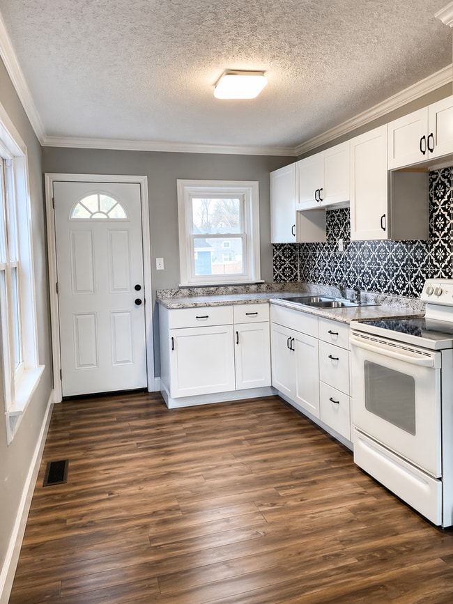 Building Photo - Updated 2BR Home with Finished Basement and 2-Car Garage