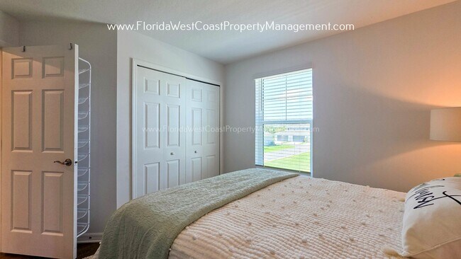 Building Photo - EXCEPTIONAL AND SPACIOUS FURNISHED TOWNHOME WITHIN WATERSIDE- NAUTIQUE!