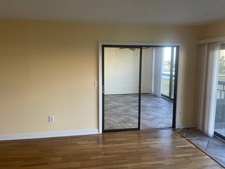 Sliders from living room into den - 7893 Sailboat Key Blvd S