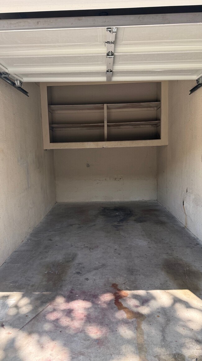 private one car garage with storage space - 7617 De Longpre Ave
