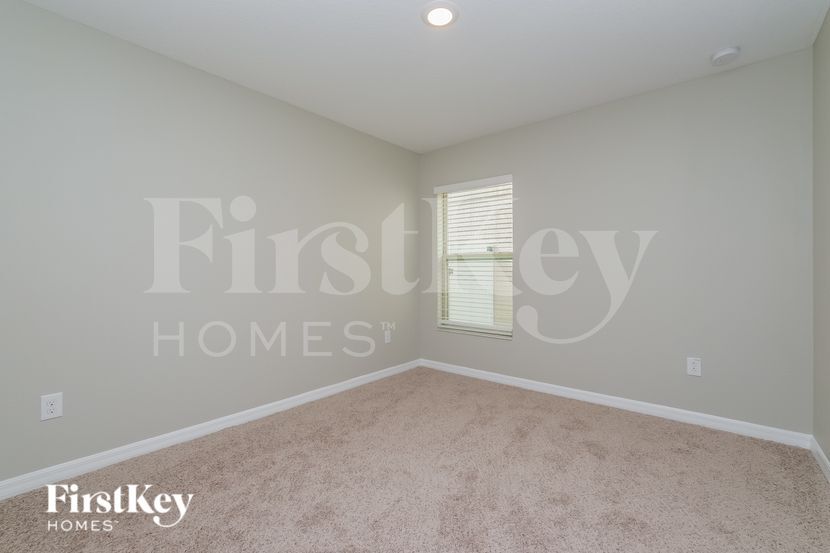 Building Photo - 6117 Tremeza Pl