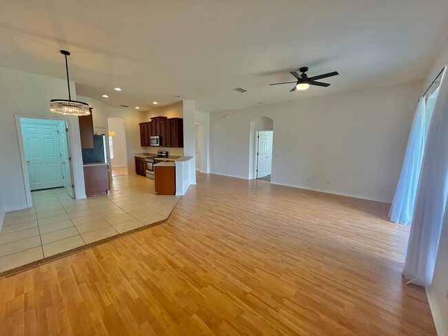 Building Photo - Spacious 4-Bed, 3-Bath Home in Guard-Gated...