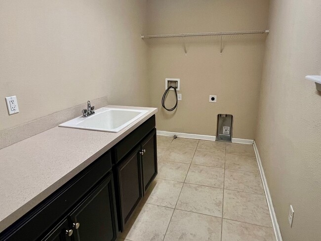 Building Photo - Spacious 5-Bedroom Home with Lawn Care Included!