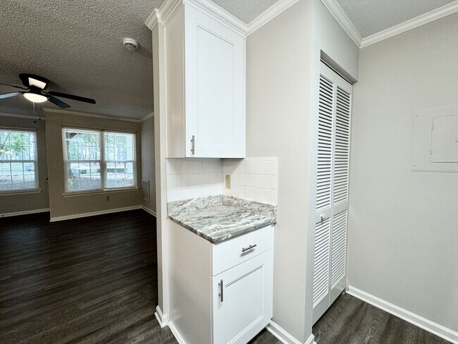 Building Photo - Updated 1st Floor/1-Level Condo Available NOW & Rent Includes Water, Sewer, Trash, Landscaping, F...