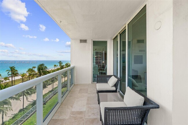 Building Photo - 10275 Collins Ave