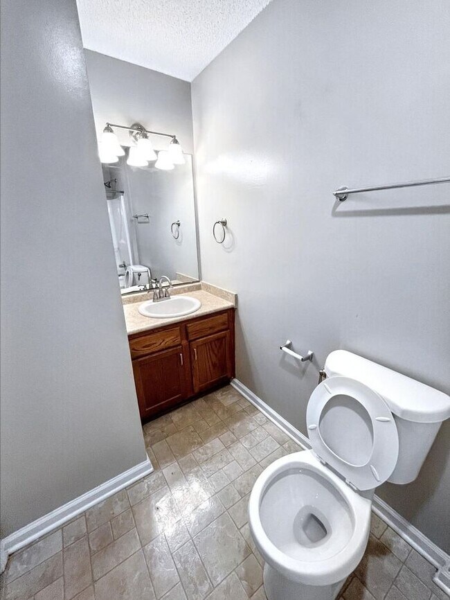 Building Photo - Spacious 3-Bedroom Home with Deck, Firepla...