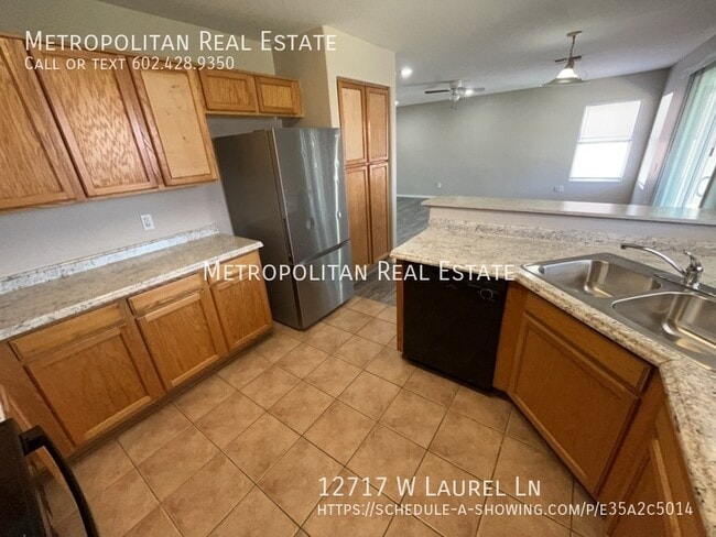 Building Photo - 12717 W Laurel Ln