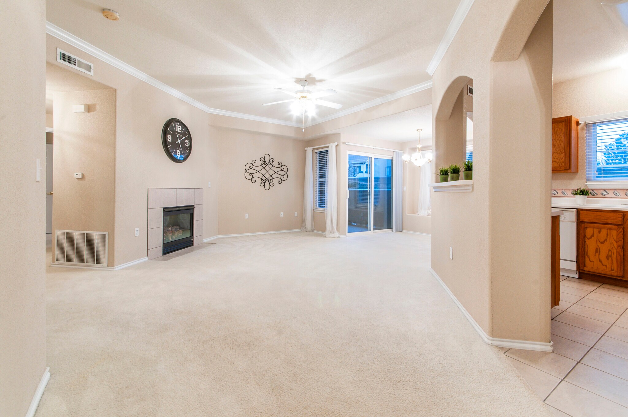 The living room has many windows provide natural light and good air circulation - 3960 Riviera Grove