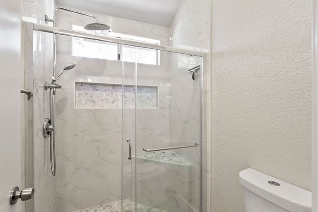 Building Photo - Beautiful End Unit Condo with Overlook of ...