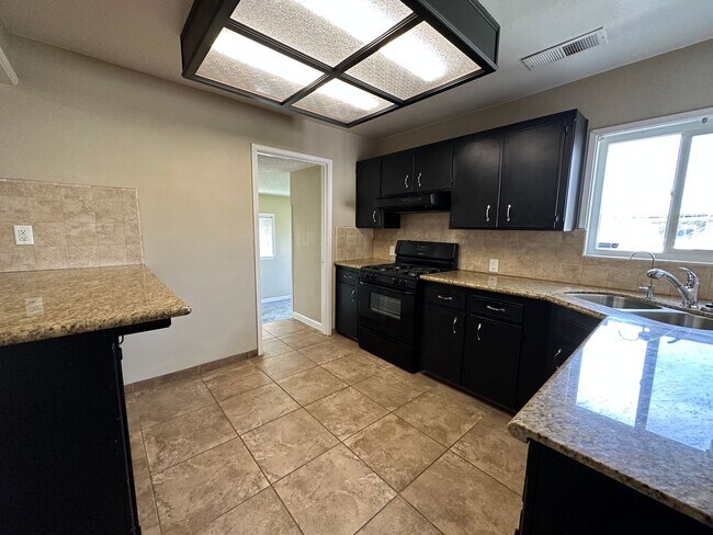 Building Photo - Eastside Corner Lot Tulare home coming soon!