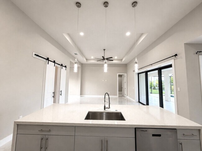 Building Photo - Move In Special! Pool Home with Canal View