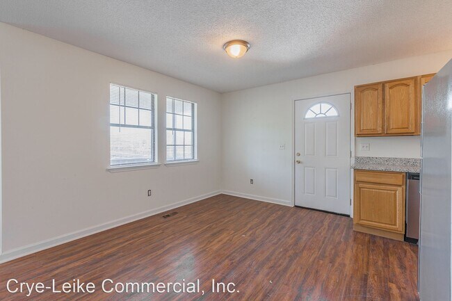 Building Photo - 4 br, 1.5 bath House - 1403 East 5th St.