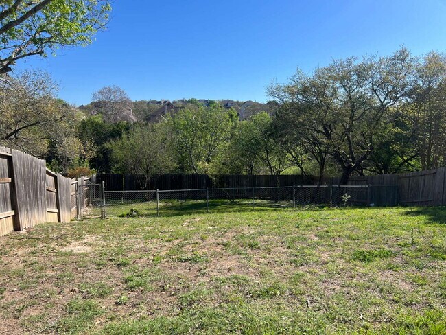 Building Photo - Charming 3-Bed /2 -Bath Sanctuary with Fireplace & Hardwood Floors, Between Evans and Bulverde at...