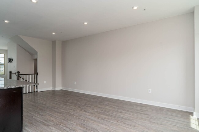 Building Photo - Townhouse with 1-Car Garage, Rooftop Deck ...