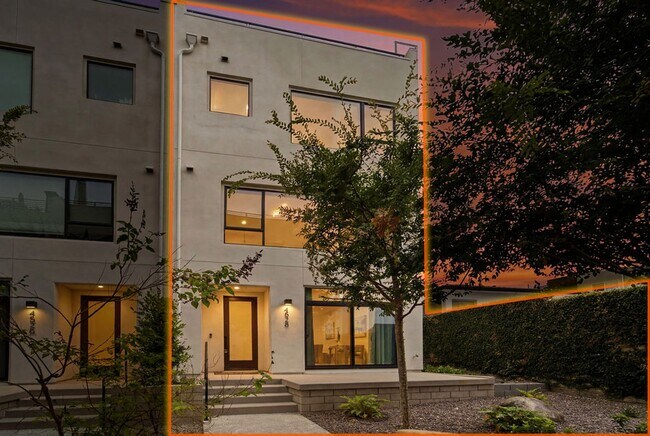 Building Photo - Modern 4-Bed with Rooftop Balcony & Dual Primary Suites