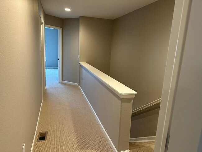 Building Photo - Large garage with attached spacious 2 bedroom townhome