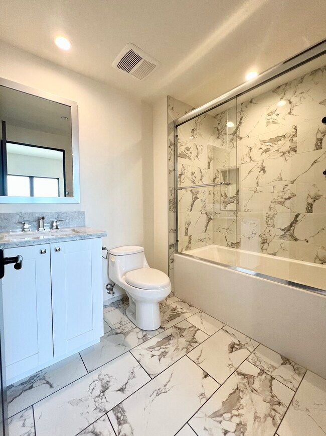 2nd bedroom en-suite bath - 859 S Lucerne Blvd