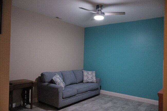 Building Photo - Expansive Mostly-Furnished Residence featuring 3 Bedrooms, a Completed Basement, and a Loft Space