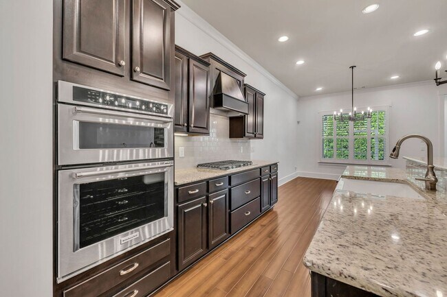 Building Photo - Beautifully maintained and move-in ready, this stunning mostly one-level all-brick home