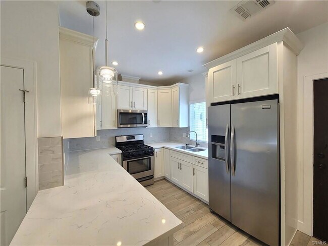 Building Photo - 5726 Cartwright Ave