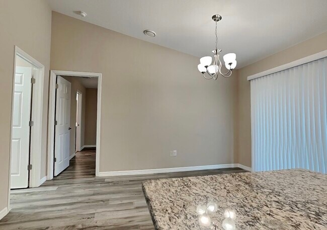 Building Photo - 8547 N Tiny Lily Dr