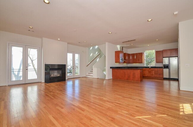 Building Photo - Stylish Corner Townhome Steps from Parks, Dining & Shopping