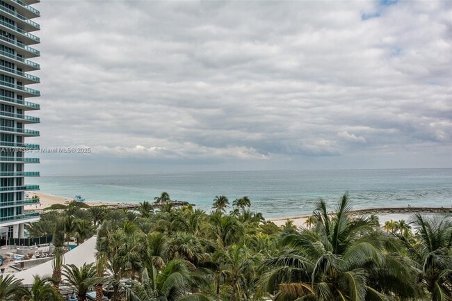 Building Photo - 10275 Collins Ave