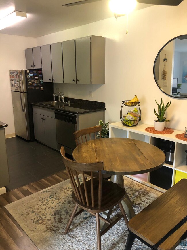 Dining Area + Kitchen - 100 Kinross Dr