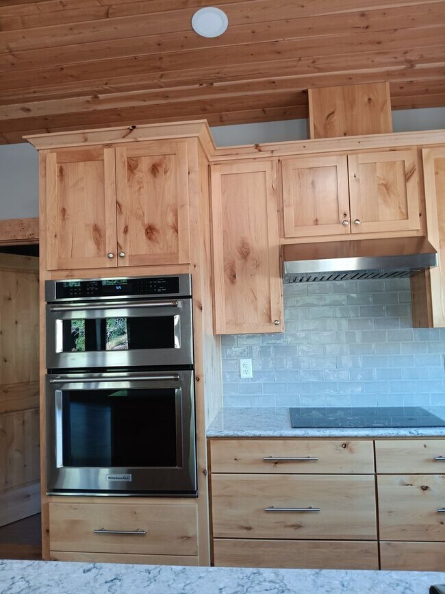 Building Photo - Beautiful Chalet Style Riverfront Property...