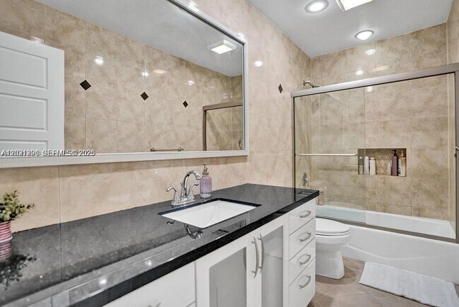 Building Photo - Northeast 214th Street, North Miami Beach, FL 33179 - 5 BR 4 BA single-family home