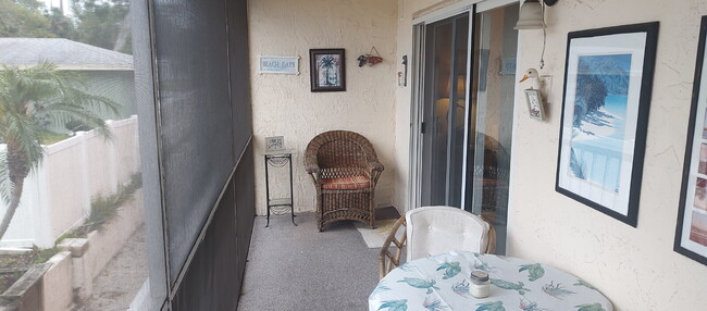 Building Photo - "Charming 2-Bed, 2-Bath Condo in Largo wit...
