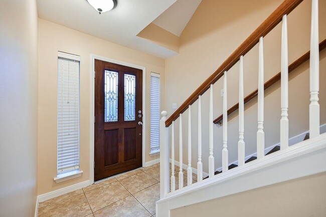 Building Photo - Gorgeous and spacious three-story townhome!