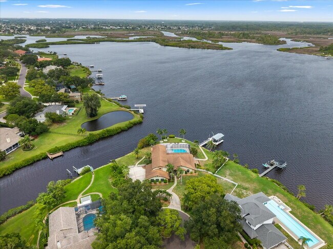 Building Photo - RENT THIS EXTRAORDINARY WATERFRONT HOME