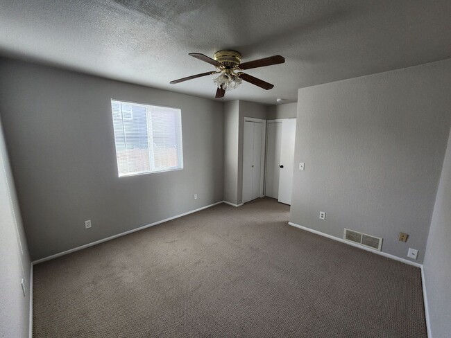 Building Photo - Shop-Ready 4BR Home with Lift-Ready Detached Garage & RV Parking Near Downtown Firestone