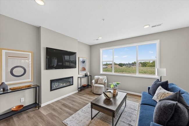 Building Photo - Westview townhome plan in Corcoran’s Hope Meadows community—a brand-new townhome development near...