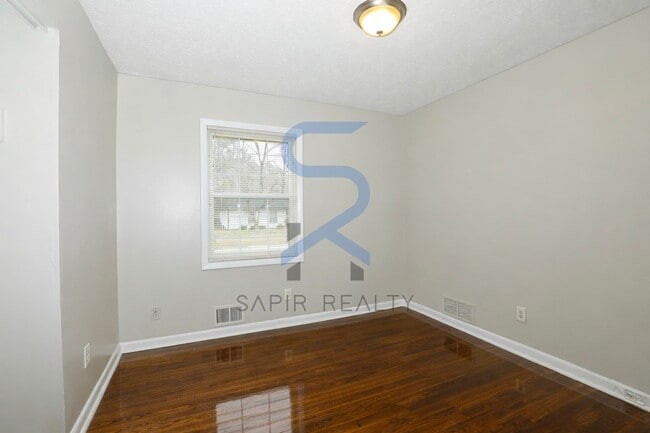 Building Photo - Timeless Ranch Charm in a Vibrant, Peaceful Corner of South River Gardens