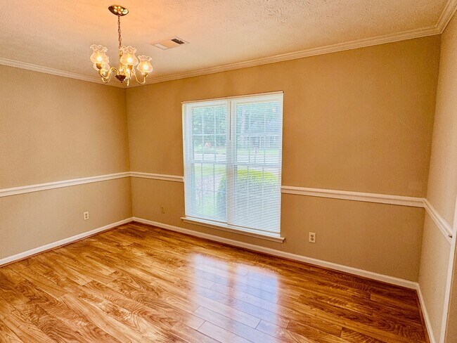 Building Photo - 3-Bedroom home is sure to captivate from t...