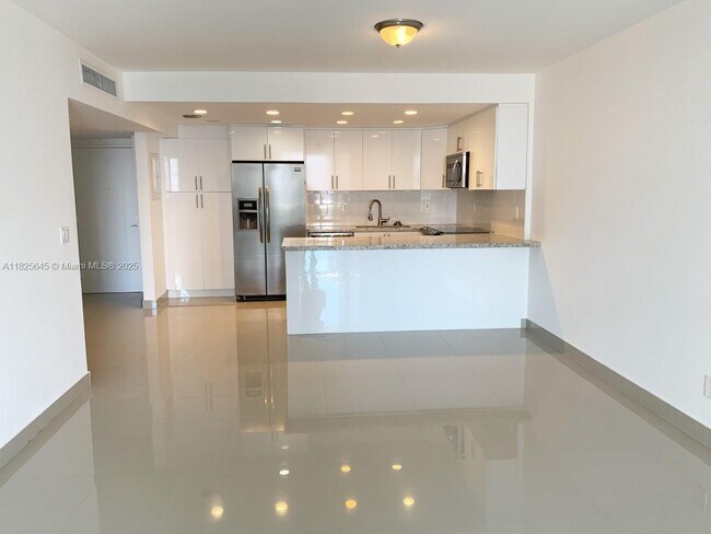 Building Photo - 19390 Collins Ave