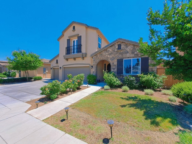 Building Photo - Now Available: 2-Story Clovis Home with 4 ...