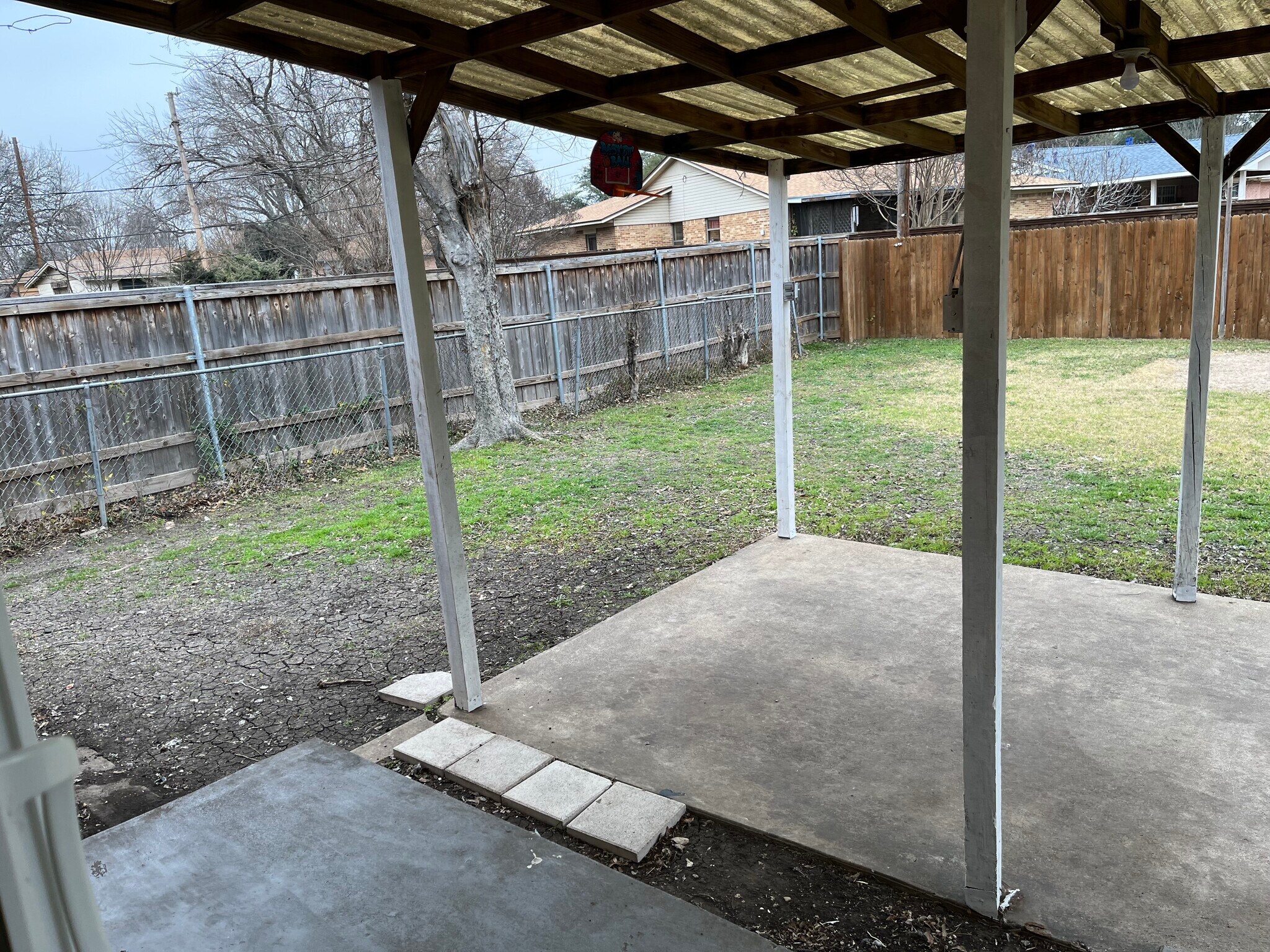 Backyard left side - 9216 Freeport Dr