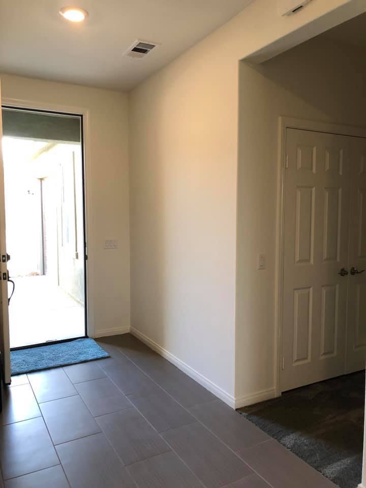 main entrance door (shared with the other duplex unit) - 7893 Boot Straps Ct