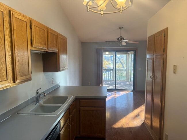 Building Photo - Beautifully Updated 3 Bed, 2 Bath, 2 Car Garage End Unit Townhome with Vaulted Ceilings