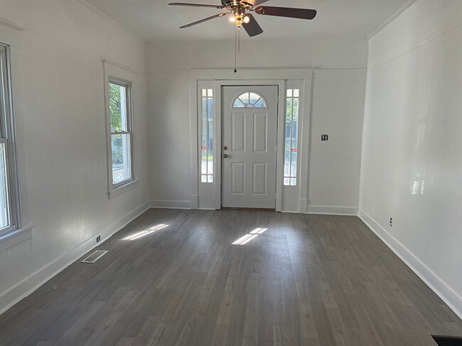 View from dining room looking at living room and front door - 1107 Central Ave