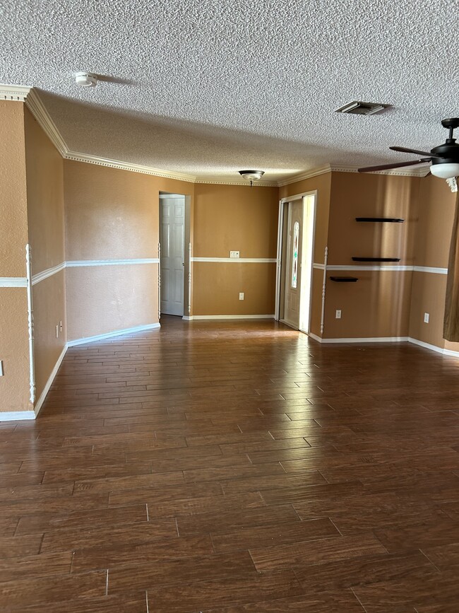 Living room area from main entrance - 18200 Adams Cir