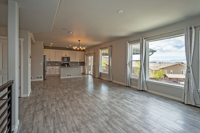 Building Photo - Spacious 5-Bedroom Home with Finished Base...