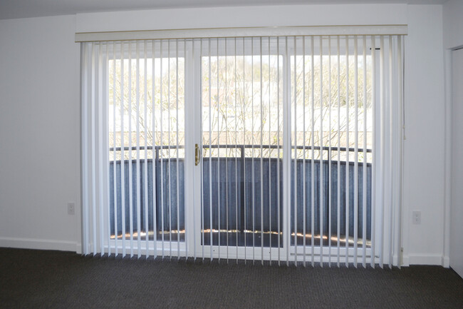 Bedroom with balcony. - 452 S Main St