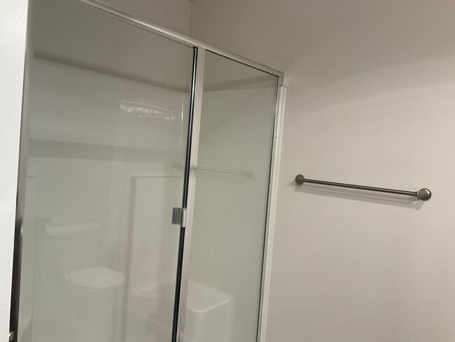 Building Photo - Riverfront Townhome with Tandem Garage & Fenced Yard